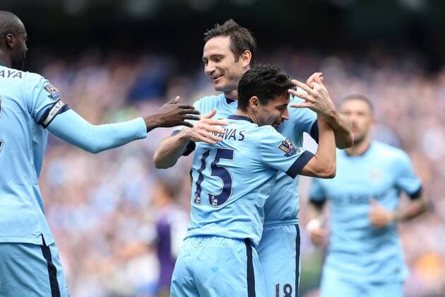 Jesus Navas of Manchester City celebrates the opening goal with Frank Lampard - Manchester City vs. West Ham United - Barclay s Premier League - Etihad Stadium - Manchester - 19 04 2015 Pic Philip Oldham Sportimage EDITORIAL USE ONLY. No use with unauthorised audio, video, data, fixture lists, club league logos or live services. Online in-match use limited to 120 images, no video emulation. No use in betting, games or single club league player publications.
