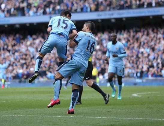Sergio Aguero of Manchester City celebrates scoring his sides second goal with Jesus Navas - Manchester City vs. West Ham United - Barclay s Premier League - Etihad Stadium - Manchester - 19 04 2015 Pic Philip Oldham Sportimage EDITORIAL USE ONLY. No use with unauthorised audio, video, data, fixture lists, club league logos or live services. Online in-match use limited to 120 images, no video emulation. No use in betting, games or single club league player publications.