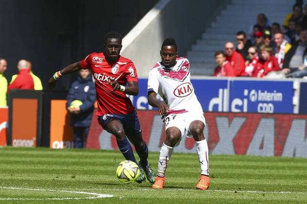 Idrissa Gana Gueye (Lille) vs Marc Planus (Bordeaux) FOOTBALL : losc OSC Lille vs Girondins Bordeaux - Ligue 1 - 19 04 2015 - GwendolineLeGoff Panoramic 