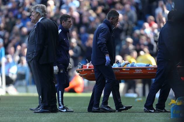 David Silva of Manchester City is stretchered off in a neck brace and on oxygen - Manchester City vs. West Ham United - Barclay s Premier League - Etihad Stadium - Manchester - 19 04 2015 Pic Philip Oldham Sportimage EDITORIAL USE ONLY. No use with unauthorised audio, video, data, fixture lists, club league logos or live services. Online in-match use limited to 120 images, no video emulation. No use in betting, games or single club league player publications.