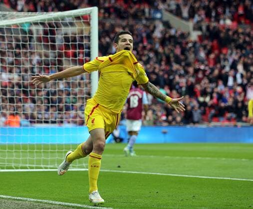 Liverpool s Philippe Coutinho celebrates scoring his sides opening goal The FA Cup - Semi Final- Aston Villa vs Liverpool - Wembley - England - 19th April 2015 - Picture David Klein Sportimage EDITORIAL USE ONLY. No use with unauthorised audio, video, data, fixture lists, club league logos or live services. Online in-match use limited to 120 images, no video emulation. No use in betting, games or single club league player publications.