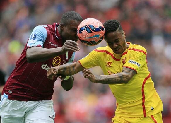Aston Villa s Jores Okore tussles with Liverpool s Raheem Sterling The FA Cup - Semi Final- Aston Villa vs Liverpool - Wembley - England - 19th April 2015 - Picture David Klein Sportimage EDITORIAL USE ONLY. No use with unauthorised audio, video, data, fixture lists, club league logos or live services. Online in-match use limited to 120 images, no video emulation. No use in betting, games or single club league player publications.