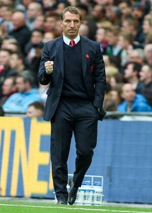Football - 2014 2015 - FA Cup Semi Final, - Aston Villa Vs Liverpool, Liverpool s Manager Brendan Rodgers with a clenched fist in celebration at Wembley Stadium COLORSPORT DANIEL BEARHAM  AST_LIV