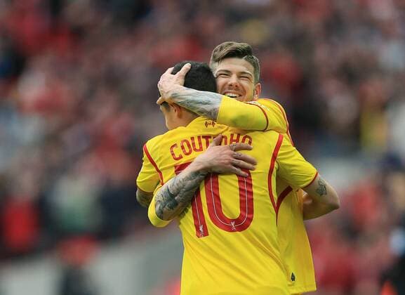 Liverpool s Philippe Coutinho celebrates scoring his sides opening goal with Alberto Moreno The FA Cup - Semi Final- Aston Villa vs Liverpool - Wembley - England - 19th April 2015 - Picture David Klein Sportimage EDITORIAL USE ONLY. No use with unauthorised audio, video, data, fixture lists, club league logos or live services. Online in-match use limited to 120 images, no video emulation. No use in betting, games or single club league player publications.