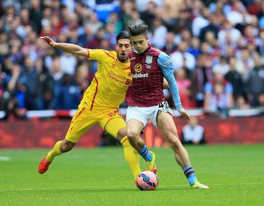 Aston Villa s Jack Grealish tussles with Liverpool s Emre Can The FA Cup - Semi Final- Aston Villa vs Liverpool - Wembley - England - 19th April 2015 - Picture David Klein Sportimage EDITORIAL USE ONLY. No use with unauthorised audio, video, data, fixture lists, club league logos or live services. Online in-match use limited to 120 images, no video emulation. No use in betting, games or single club league player publications.