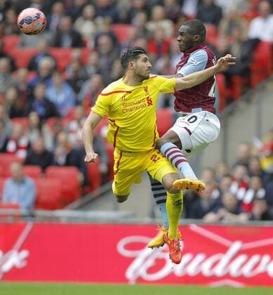 Christian Benteke of Aston Villa competes with Emre Can of Liverpool - Football - FA Cup semi-final - Aston Villa vs Liverpool - Wembley Stadium London - Season 2014 15 - 19th April 2015 - Photo Malcolm Couzens Sportimage EDITORIAL USE ONLY. No use with unauthorised audio, video, data, fixture lists, club league logos or live services. Online in-match use limited to 120 images, no video emulation. No use in betting, games or single club league player publications.