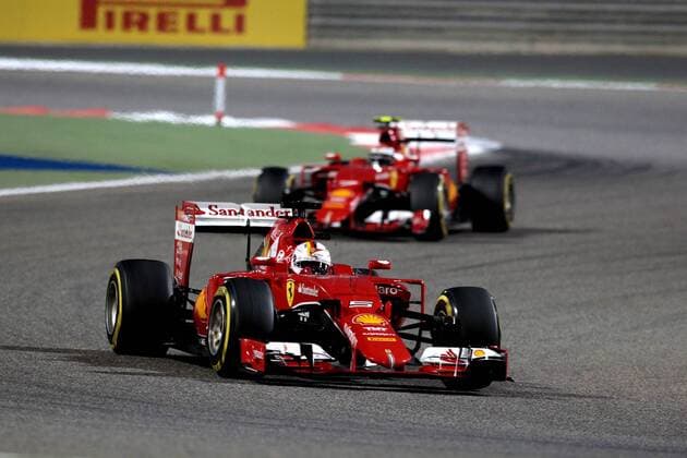 FORMULA 1 - Bahrain GP SAKHIR,BAHRAIN,19.APR.15 - MOTORSPORTS, FORMULA 1 - Grand Prix of Bahrain, Bahrain International Circuit. Image shows Sebastian Vettel (GER Ferrari) and Kimi Raikkoenen (FIN Ferrari). GEPAxpictures xFritzxMueller 