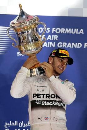 FORMULA 1 - Bahrain GP SAKHIR,BAHRAIN,19.APR.15 - MOTORSPORTS, FORMULA 1 - Grand Prix of Bahrain, Bahrain International Circuit, award ceremony. Image shows Lewis Hamilton (GBR Mercedes GP) with the trophy. GEPAxpictures xFritzxMueller 