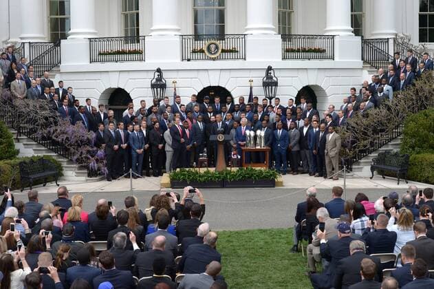 WUHAN, April 23, 2015 -- U.S. President Barack Obama (C) speaks at a ceremony honoring the Super Bowl Champion New England Patriots on the South Lawn of the White House in Washington D.C., the United States, April 23, 2015. ) (SP)U.S.-WASHINTON D.C.-FOOTBALL-NEW ENGLAND PATRIOTS YinxBogu 