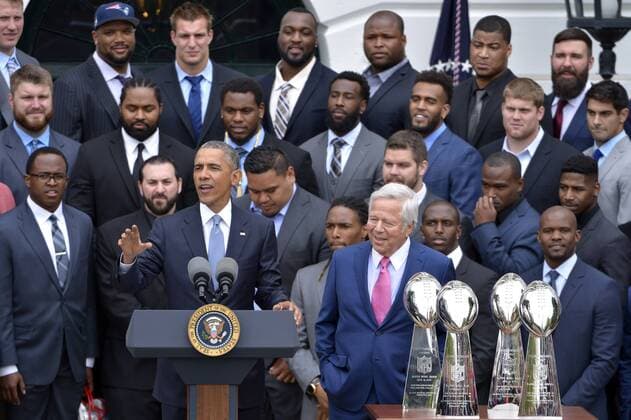 WUHAN, April 23, 2015 -- U.S. President Barack Obama (front L) speaks as New England Patriots owner Robert Kraft (front R) listens at a ceremony honoring the Super Bowl Champion New England Patriots on the South Lawn of the White House in Washington D.C., the United States, April 23, 2015. ) (SP)U.S.-WASHINTON D.C.-FOOTBALL-NEW ENGLAND PATRIOTS YinxBogu 
