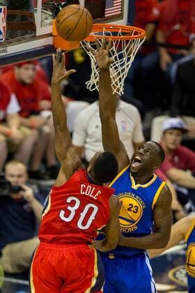 April 23, 2015: New Orleans Pelicans guard Norris Cole (30) shoots over Golden State Warriors forward Draymond Green (23) during the game between Golden State Warriors and New Orleans Pelicans at the Smoothie King Center in New Orleans, LA. Stephen Lew CSM NBA Basketball Herren USA 2015: Warriors at Pelicans APR 23 - ZUMAc04_