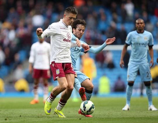 Jack Grealish of Aston Villa battles David Silva of Manchester City - Manchester City vs. Aston Villa - Barclay s Premier League - Etihad Stadium - Manchester - 25 04 2015 Pic Philip Oldham Sportimage EDITORIAL USE ONLY. No use with unauthorised audio, video, data, fixture lists, club league logos or live services. Online in-match use limited to 120 images, no video emulation. No use in betting, games or single club league player publications.