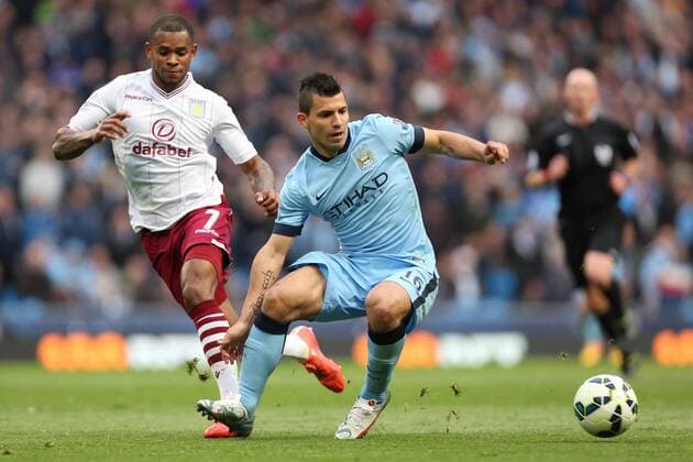 Leandro Bacuna of Aston Villa pressures Sergio Aguero of Manchester City - Manchester City vs. Aston Villa - Barclay s Premier League - Etihad Stadium - Manchester - 25 04 2015 Pic Philip Oldham Sportimage EDITORIAL USE ONLY. No use with unauthorised audio, video, data, fixture lists, club league logos or live services. Online in-match use limited to 120 images, no video emulation. No use in betting, games or single club league player publications.
