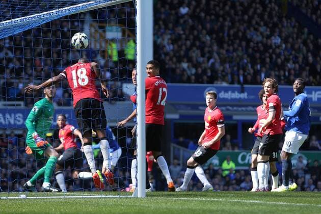 David de Gea and Chris Smalling look back as Ashley Young of Manchester United ManU fails to stop John Stones of Everton s headed goal - Everton vs. Manchester United - Barclay s Premier League - Goodison Park - Liverpool- 26 04 2015 Pic Philip Oldham Sportimage EDITORIAL USE ONLY. No use with unauthorised audio, video, data, fixture lists, club league logos or live services. Online in-match use limited to 120 images, no video emulation. No use in betting, games or single club league player publications.