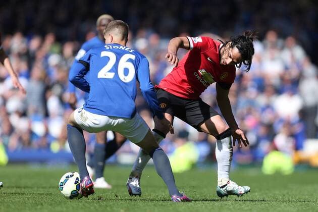 Radamel Falcao of Manchester United ManU loses the ball to John Stones of Everton - Everton vs. Manchester United - Barclay s Premier League - Goodison Park - Liverpool- 26 04 2015 Pic Philip Oldham Sportimage EDITORIAL USE ONLY. No use with unauthorised audio, video, data, fixture lists, club league logos or live services. Online in-match use limited to 120 images, no video emulation. No use in betting, games or single club league player publications.