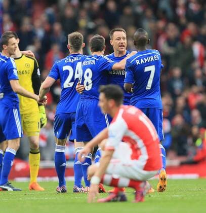 Chelsea s John Terry celebrates at the final whistle Barclays Premier League - Arsenal vs Chelsea - Emirates Stadium - England - 26th April 2015 - Picture David Klein Sportimage EDITORIAL USE ONLY. No use with unauthorised audio, video, data, fixture lists, club league logos or live services. Online in-match use limited to 120 images, no video emulation. No use in betting, games or single club league player publications.