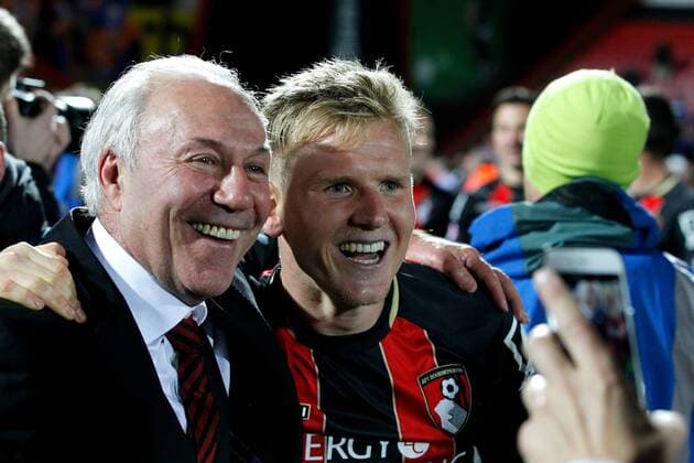 Football - 2014 2015 Sky Bet Championship - AFC Bournemouth Bournemouth Chairman Jeff Mostyn and Matt Ritchie celebrate on the pitch after winning promotion to the premier league 