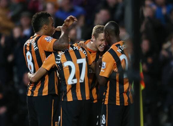 Michael Dawson of Hull City celebrates scoring the first goal - Barclays Premier League - Hull City vs Liverpool - KC Stadium - Hull - England - 28th April 2015 - Picture Simon Bellis Sportimage EDITORIAL USE ONLY. No use with unauthorised audio, video, data, fixture lists, club league logos or live services. Online in-match use limited to 120 images, no video emulation. No use in betting, games or single club league player publications.