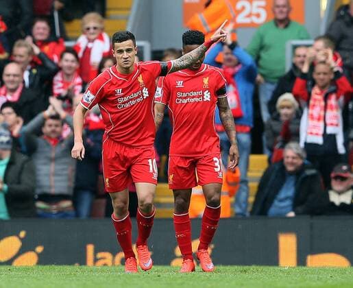 Philippe Coutinho of Liverpool celebrates scoring the first goal - Barclays Premier League - Liverpool vs QPR - Anfield Stadium - Liverpool - England - 2nd May 2015 - Picture Simon Bellis Sportimage EDITORIAL USE ONLY. No use with unauthorised audio, video, data, fixture lists, club league logos or live services. Online in-match use limited to 120 images, no video emulation. No use in betting, games or single club league player publications.