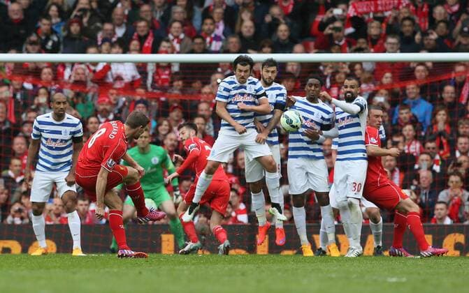 Steven Gerrard of Liverpool takes a free kick - Barclays Premier League - Liverpool vs QPR - Anfield Stadium - Liverpool - England - 2nd May 2015 - Picture Simon Bellis Sportimage EDITORIAL USE ONLY. No use with unauthorised audio, video, data, fixture lists, club league logos or live services. Online in-match use limited to 120 images, no video emulation. No use in betting, games or single club league player publications.