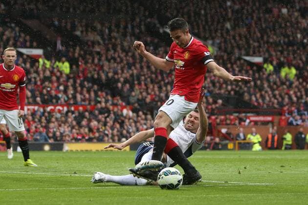 West Brom s Gareth McAuley puts in a last minute challenge on Robin van Persie of Manchester United ManU - Manchester United vs. West Bromwich Albion - Barclay s Premier League - Old Trafford - Manchester - 02 05 2015 Pic Philip Oldham Sportimage EDITORIAL USE ONLY. No use with unauthorised audio, video, data, fixture lists, club league logos or live services. Online in-match use limited to 120 images, no video emulation. No use in betting, games or single club league player publications.