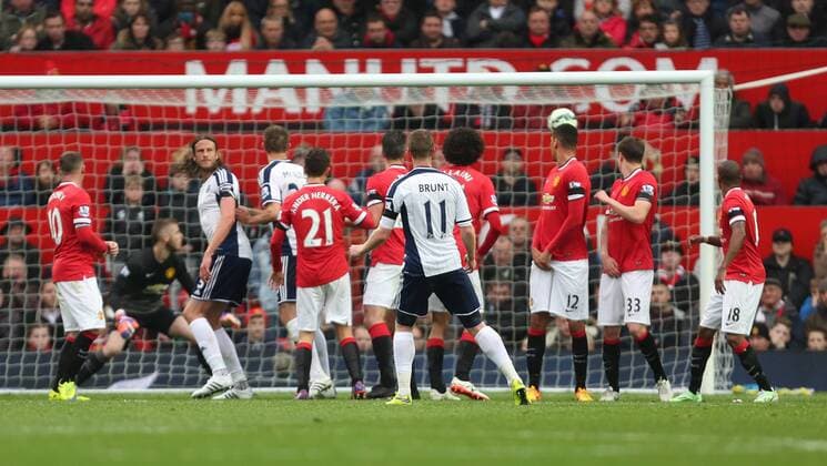 West Brom s Chris Brunt watches on as his deflected free kick hits the back of the net for the opening goal - Manchester United ManU vs. West Bromwich Albion - Barclay s Premier League - Old Trafford - Manchester - 02 05 2015 Pic Philip Oldham Sportimage EDITORIAL USE ONLY. No use with unauthorised audio, video, data, fixture lists, club league logos or live services. Online in-match use limited to 120 images, no video emulation. No use in betting, games or single club league player publications.