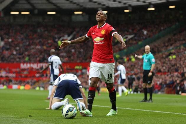 Ashley Young of Manchester United ManU looks dejected as the referee awards a free kick against him - Manchester United vs. West Bromwich Albion - Barclay s Premier League - Old Trafford - Manchester - 02 05 2015 Pic Philip Oldham Sportimage EDITORIAL USE ONLY. No use with unauthorised audio, video, data, fixture lists, club league logos or live services. Online in-match use limited to 120 images, no video emulation. No use in betting, games or single club league player publications.