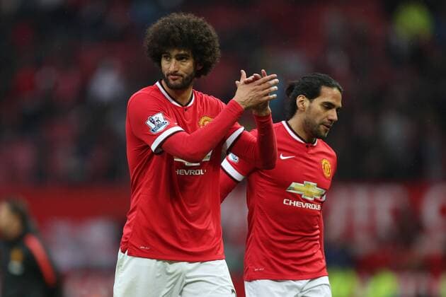Marouane Fellaini and Radamel Falcao of Manchester United ManU look dejected - Manchester United vs. West Bromwich Albion - Barclay s Premier League - Old Trafford - Manchester - 02 05 2015 Pic Philip Oldham Sportimage EDITORIAL USE ONLY. No use with unauthorised audio, video, data, fixture lists, club league logos or live services. Online in-match use limited to 120 images, no video emulation. No use in betting, games or single club league player publications.