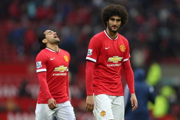 Marouane Fellaini and Radamel Falcao of Manchester United ManU look dejected - Manchester United vs. West Bromwich Albion - Barclay s Premier League - Old Trafford - Manchester - 02 05 2015 Pic Philip Oldham Sportimage EDITORIAL USE ONLY. No use with unauthorised audio, video, data, fixture lists, club league logos or live services. Online in-match use limited to 120 images, no video emulation. No use in betting, games or single club league player publications.