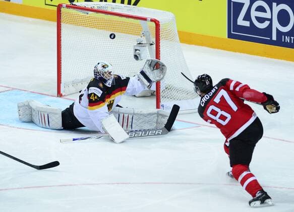 Sidney Crosby (CAN), left, and goalkeeper Dennis Endras (GER) in action during the Ice hockey Eishockey World Championship WM Weltmeisterschaft Group A match Canada vs Germany in Prague, Czech Republic, May 3, 2015. (CTKxPhoto RomanxVondrous) CTKPhotoP201505030437901  vnd