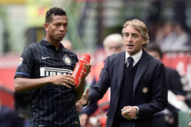 Mailand, Italien - Serie A, Inter Mailand vs. Chievo Verona: Fredy Guarin-Roberto mancini 