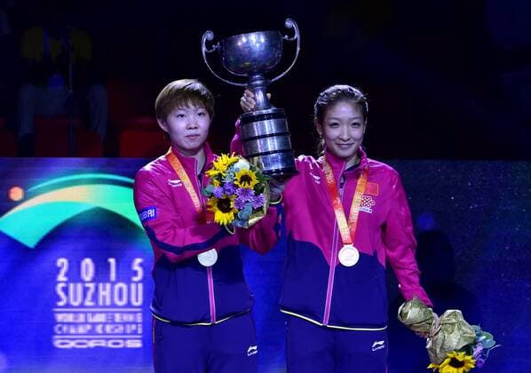 SUZHOU, CHINA - MAY 03: (CHINA OUT) Liu Shiwen and Zhu Yuling of China pose with their trophy after winning women s doubles final match against Ding Ning and Li Xiaoxia of China on day eight of the 2015 World Table tennis Tischtennis Championships at the Suzhou International Expo Center on May 3, 2015 in Suzhou, China.  CFP466952907 