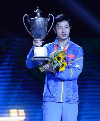 SUZHOU, CHINA - MAY 03: (CHINA OUT) Ma Long of China poses with his trophy after winning men s singles final match against Fang Bo of China on day eight of the 2015 World Table tennis Tischtennis Championships at the Suzhou International Expo Center on May 3, 2015 in Suzhou, China.  CFP466952935 