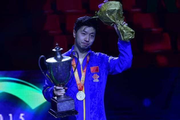 SUZHOU, CHINA - MAY 03: (CHINA OUT) Ma Long of China poses with his trophy after winning men s singles final match against Fang Bo of China on day eight of the 2015 World Table tennis Tischtennis Championships at the Suzhou International Expo Center on May 3, 2015 in Suzhou, China.  CFP466952940 