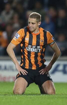 Michael Dawson of Hull City dejected - Barclays Premier League - Hull City vs Arsenal - KC Stadium - Hull - England - 4th May 2015 - Picture Simon Bellis Sportimage EDITORIAL USE ONLY. No use with unauthorised audio, video, data, fixture lists, club league logos or live services. Online in-match use limited to 120 images, no video emulation. No use in betting, games or single club league player publications.