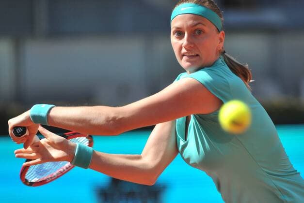 (150505) -- MADRID, May 5, 2015 -- Czech tennis player Petra Kvitova returns the ball against U.S. tennis player Coco Vandeweghe during day four of the Madrid Open tournament in Madrid, Spain, on May 5, 2015. Kvitova won 2-1. ) (SP)SPAIN-MADRID-TENNIS XiexHaining 