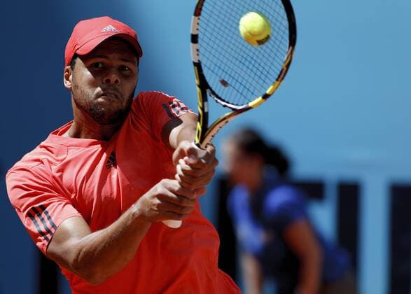 May 5, 2014 - Madrid, Spain - Spain, Madrid : French tennis player Jo-Wilfried Tsonga returns the ball to Czech tennis player Lukas Rosol during the Madrid ATP Tennis Herren Masters Series Tournament tennis match, day 5 on May 5, 2015 in Madrid Madrid Open Tennis 2015: Jo-Wilfried Tsonga vs Lukas Rosol  - ZUMAn230