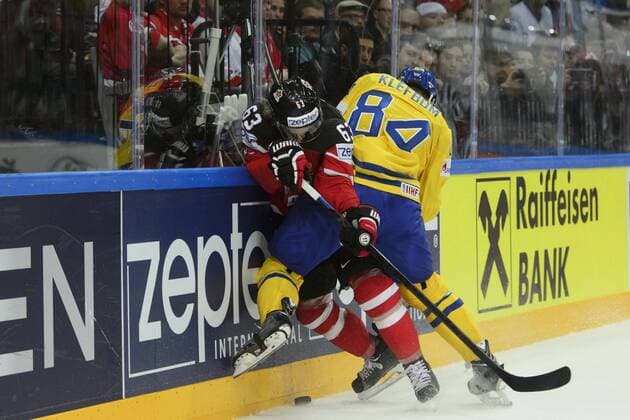 Tyler Ennis (CAN), left, and Oscar Klefbom (SWE) in action during the Ice hockey Eishockey World Championship WM Weltmeisterschaft Group A match Sweden vs Canada in Prague, Czech Republic, May 6, 2015. (CTKxPhoto MichalxKamaryt) CTKPhotoP201505060938401  kmt 2