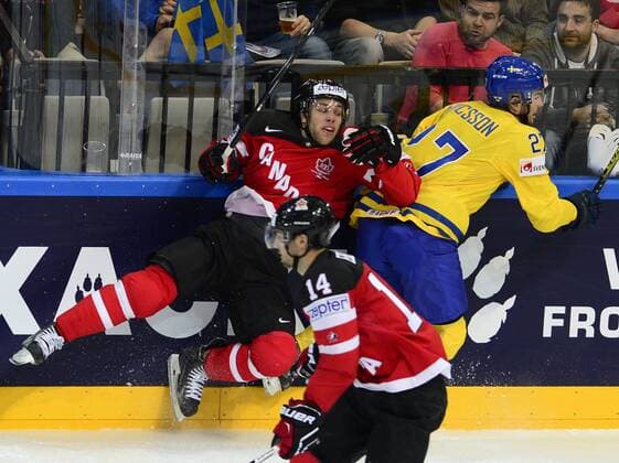 Taylor Hall (CAN), left, and immie Ericsson (SWE) in action during the Ice hockey Eishockey World Championship WM Weltmeisterschaft Group A match Sweden vs Canada in Prague, Czech Republic, May 6, 2015. (CTKxPhoto RomanxVondrous) CTKPhotoP201505060998901  vnd