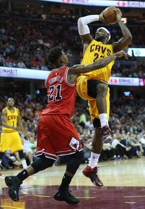 May 6, 2015 - Cleveland, OH, USA - The Cleveland Cavaliers LeBron James (23) shoots over the Chicago Bulls Jimmy Butler (21) in the third quarter during Game 2 of the Eastern Conference semifinals at Quicken Loans Arena in Cleveland on Wednesday, May 6, 2015. The Cavs won, 106-91, to even the series. Chicago at Cleveland, Game 2 - ZUMAm67_