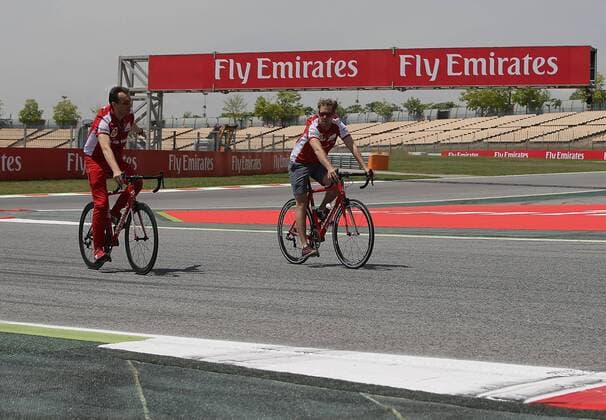 May 7, 2015 - Barcelona, Spain - SEBASTIAN VETTEL of Germany and Scuderia Ferrari is seen riding a bicycle on the track during preparations to the 2015 Formula 1 Spanish Grand Prix at Circuit de Catalunya in Barcelona, Spain. F1 2015 - Spanish Grand Prix - Preparations - ZUMAg147