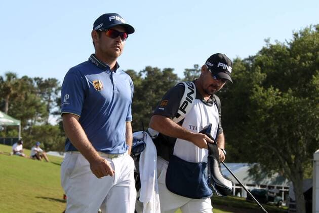 May 7, 2015 - Ponte Vedra Beach, Florida, United States - Louis Oosthuizen (L) walks off the tee with his caddie during the first round of THE PLAYERS Championship. THE PLAYERS Championship - Round 1 - ZUMAw109