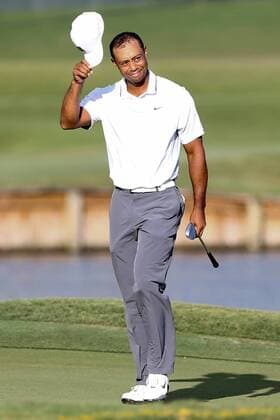 May 7, 2015 - Ponte Vedra Beach, Florida, United States - Tiger Woods tips his cap to the crowd after making a birdie on the 17th green during the first round of THE PLAYERS Championship. THE PLAYERS Championship - Round 1 - ZUMAw109