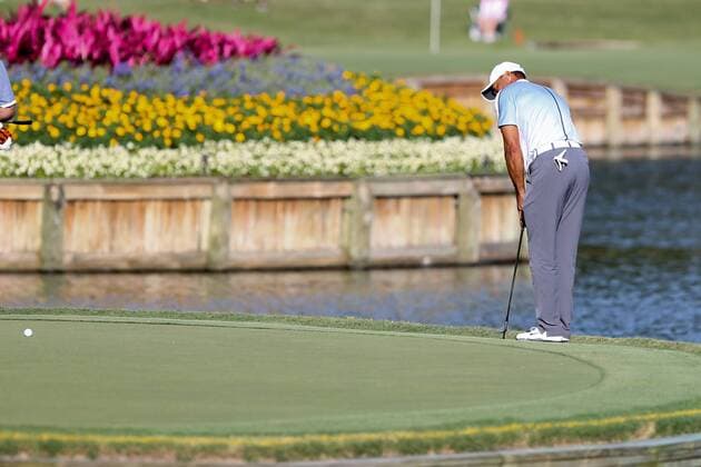 May 7, 2015 - Ponte Vedra Beach, Florida, United States - Tiger Woods chips in the 17th green for a birdie during the first round of THE PLAYERS Championship. THE PLAYERS Championship - Round 1 - ZUMAw109