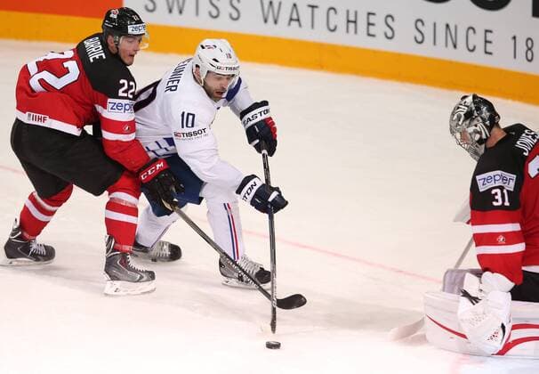 Ice hockey Eishockey - IIHF Ice Hockey WC 2015 PRAGUE,CZECH REPUBLIC,09.MAY.15 - ICE HOCKEY - IIHF World Ice Hockey Championships, international match Länderspiel France vs Canada. Image shows Tyson Barrie (CAN) and Laurent Meunier (FRA) and Martin Jones (CAN). GEPAxpictures xAndreasxPranter 