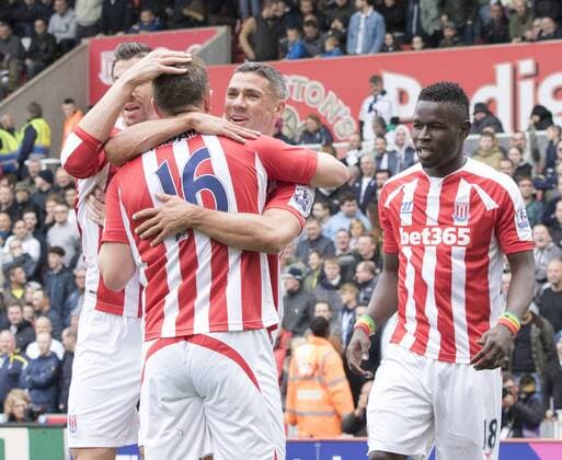 09.05.2015. Stoke, England. Barclays Premier League. Stoke versus Tottenham Hotspur. Goal celebration after Stoke City midfielder Charlie Adam scores the matches first goal (1-0). xRolandxHarrisonx  ActionPlus11619250