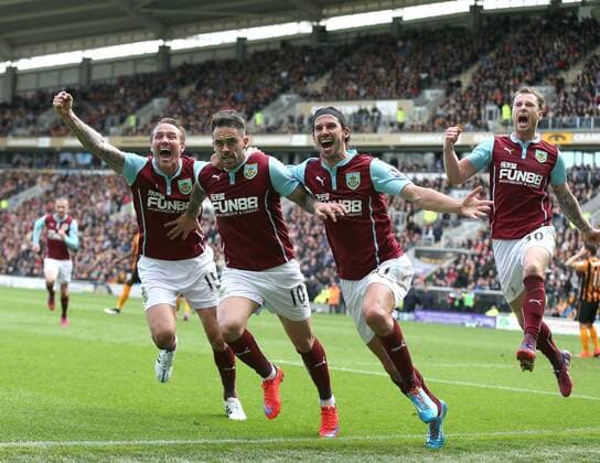 Danny Ings of Burnley (2L) celebrates scoring the first goal - Barclays Premier League - Hull City vs Burnley - KC Stadium - Hull - England - 9th May 2015 - Picture Simon Bellis Sportimage EDITORIAL USE ONLY. No use with unauthorised audio, video, data, fixture lists, club league logos or live services. Online in-match use limited to 120 images, no video emulation. No use in betting, games or single club league player publications.