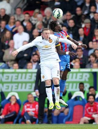 Crystal Palace s Pape Souare tussles with Manchester United ManU s Wayne Rooney Barclays Premier League - Crystal Palace vs Manchester United- Selhurst Park - England - 9th May 2015 - Picture David Klein Sportimage EDITORIAL USE ONLY. No use with unauthorised audio, video, data, fixture lists, club league logos or live services. Online in-match use limited to 120 images, no video emulation. No use in betting, games or single club league player publications.