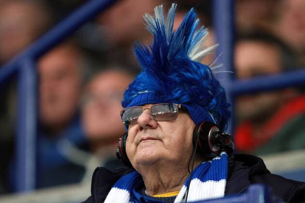 Leicester City v Southampton . . Leicester, UK . . 09.05.2015 A Leicester fan with a Mohican wig watches the game. 