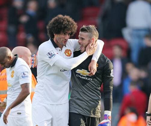 Manchester United ManU s Marouane Fellaini celebrates at the final whistle with David De Gea Barclays Premier League - Crystal Palace vs Manchester United- Selhurst Park - England - 9th May 2015 - Picture David Klein Sportimage EDITORIAL USE ONLY. No use with unauthorised audio, video, data, fixture lists, club league logos or live services. Online in-match use limited to 120 images, no video emulation. No use in betting, games or single club league player publications.